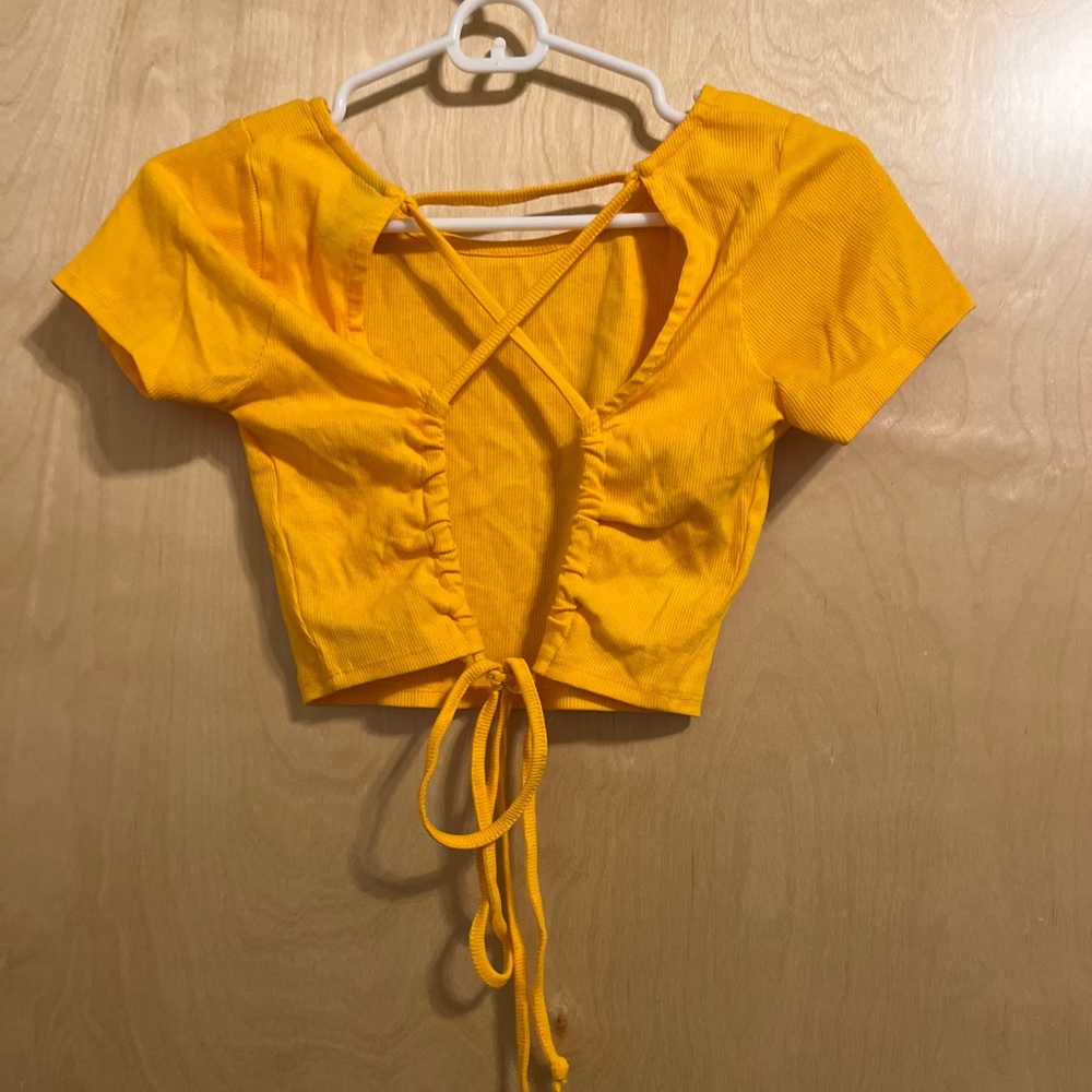 yellow open back crop top